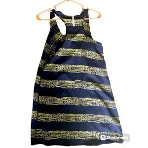 Small blue and gold print racerback mini dress